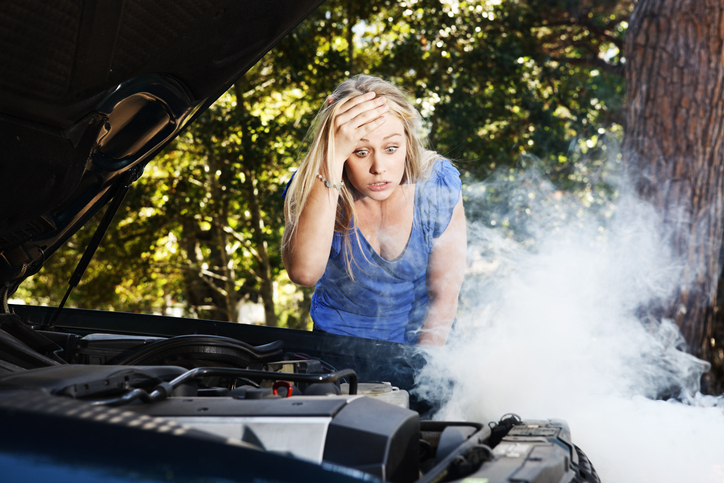 Baffled blonde is frustrated by her car's smoking engine 4