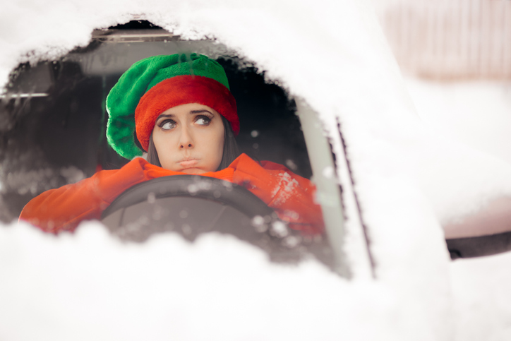 Funny Christmas Girl Driving Through the Snow on Bad Weather